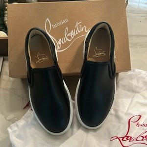 Like new authentic Christian Louboutin Masteral Tissima slip on sneakers